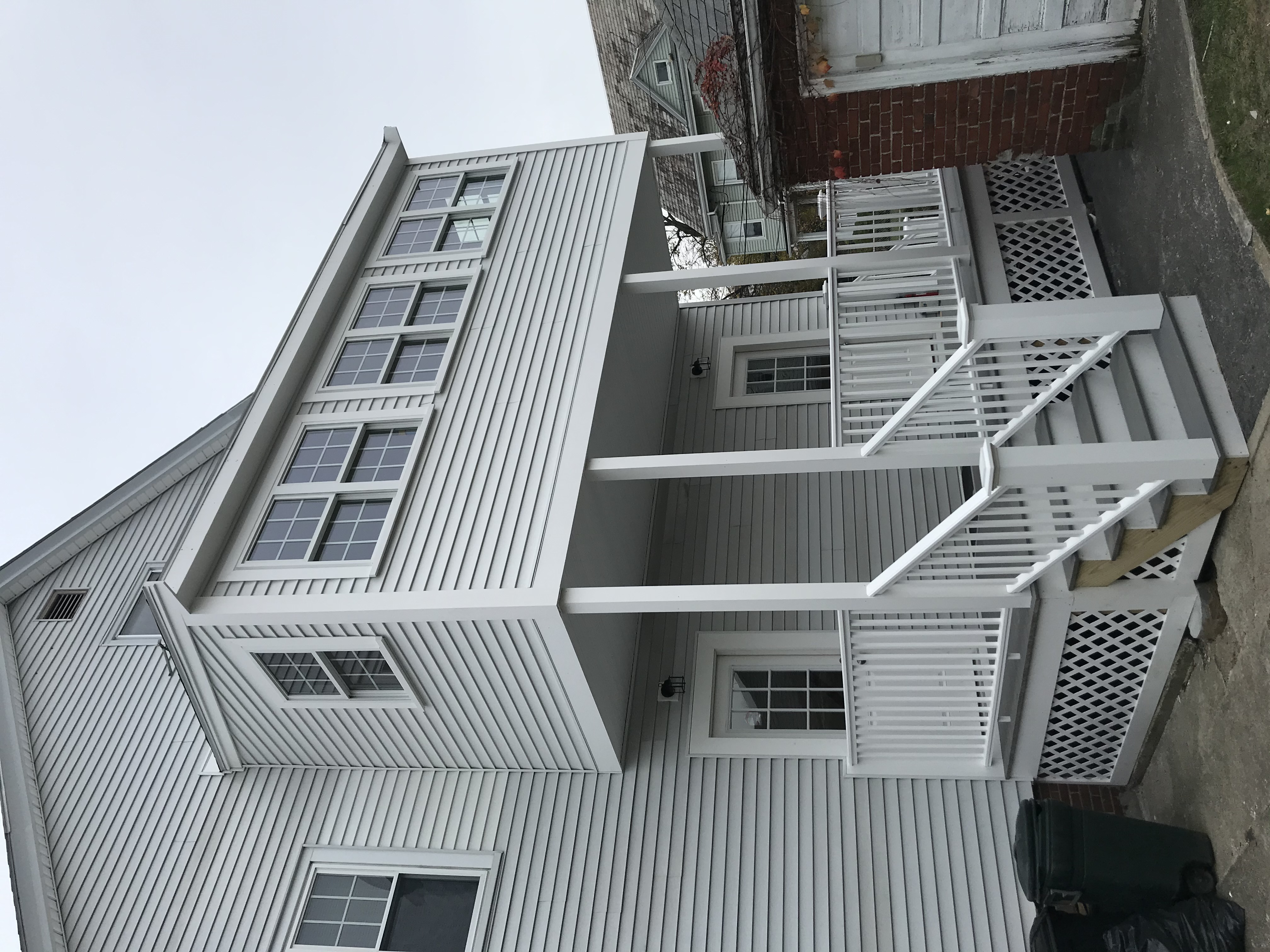 Multi-story home exterior renovation
