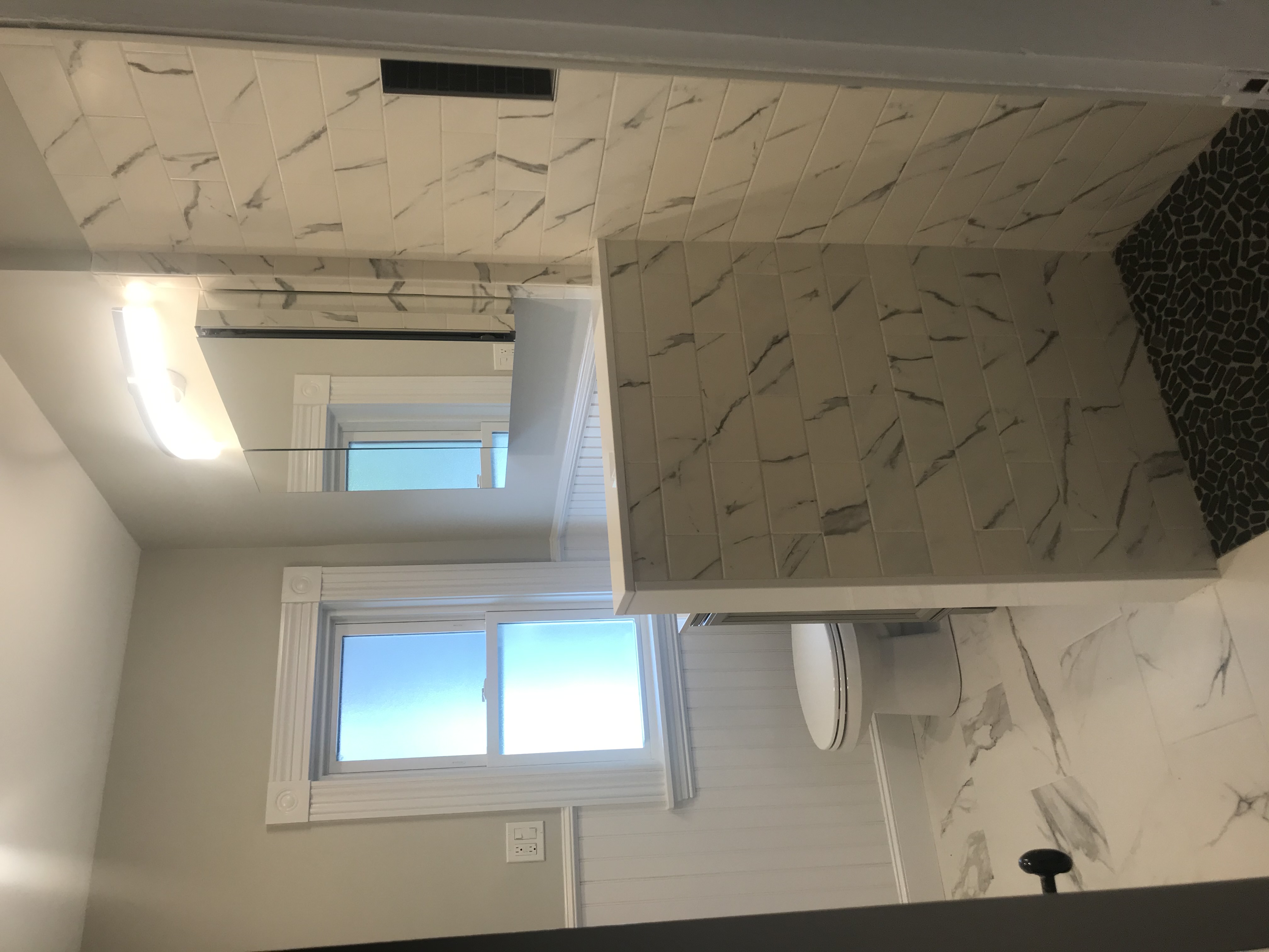 Bathroom remodel with marble tile
